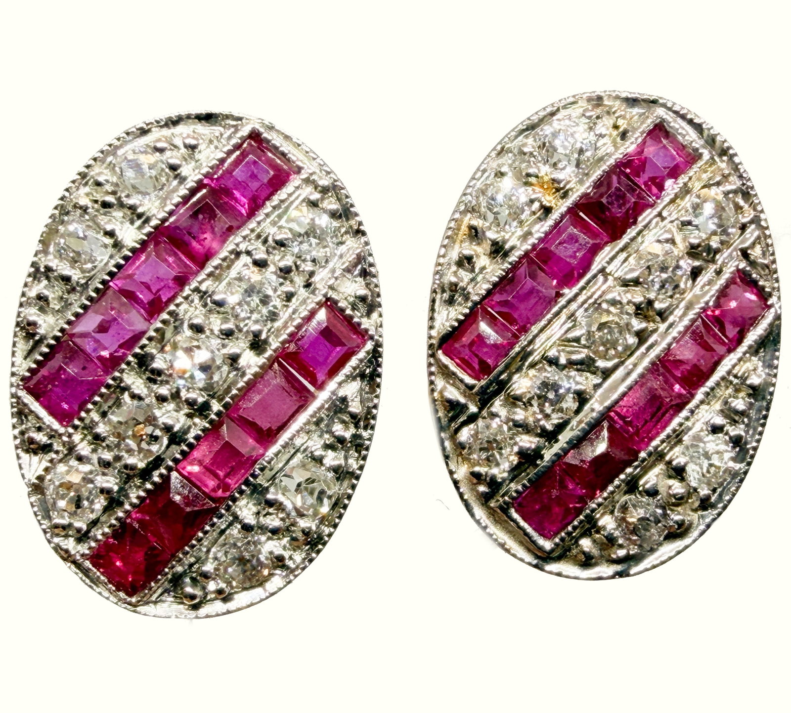 PAIR OF ART-DECO RUBY AND DIAMOND EARRINGS: PAIR OF ART-DECO RUBY AND DIAMOND EARRINGS,testing high carat gold.Rich and vibrant rubies.Diamonds bright and lively.L. 1.4 cm.