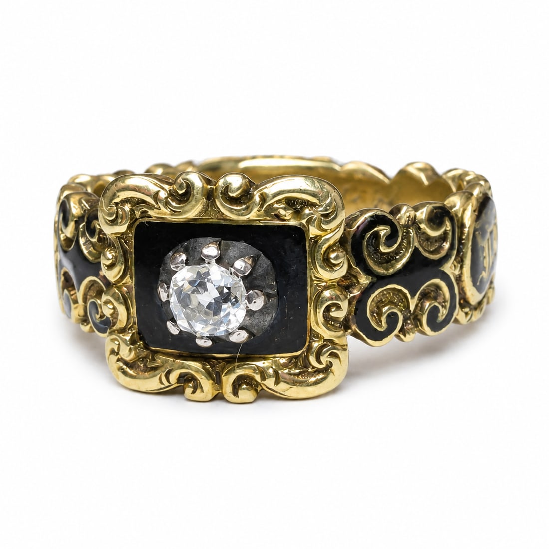 GEORGIAN ENAMEL AND DIAMOND RING: GEORGIAN ENAMEL AND DIAMOND RING,6.3 grams, testing 18 ct. gold.Lovely old cut diamond.The bank with inlaid text: In Memory Of.The inside of the band with text and dated 1836.Locket back.Size L 1/2.