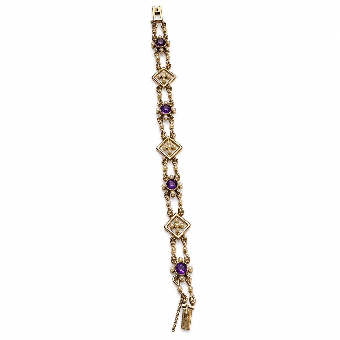 ART-NOUVEAU AMETHYST AND PEARL BRACELET: ART-NOUVEAU AMETHYST AND PEARL BRACELET,15,6 grams, 15 ct. gold.Rich and vibrant amethyst.Pearls generally well matched.L. 17.5 cm.