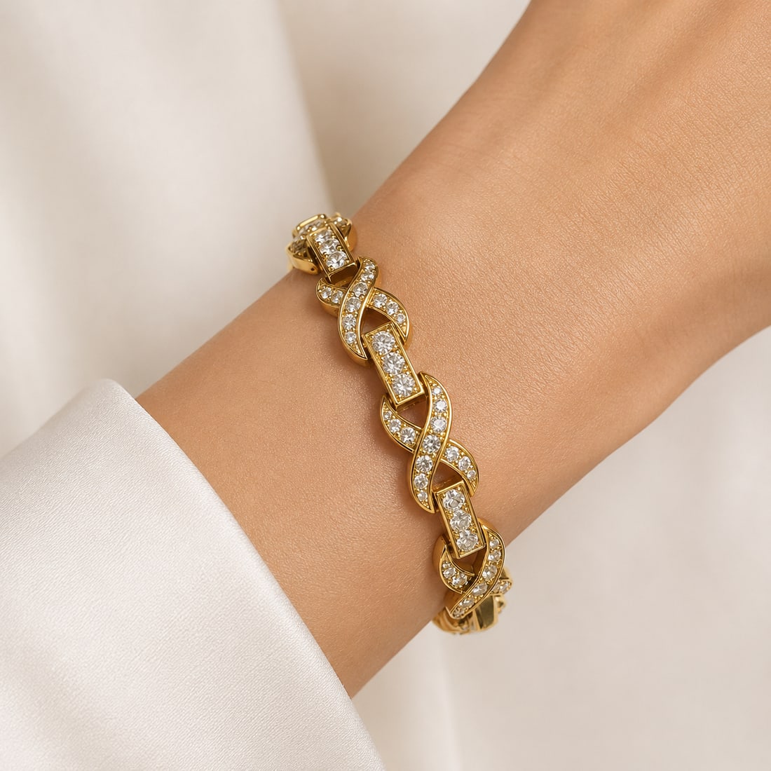 DIAMOND BRACELET: DIAMOND BRACELET,18.6 grams, testing 18 ct. gold.Bright and lively diamonds, totalling approx. 2.20 ct.L. 18 cm.