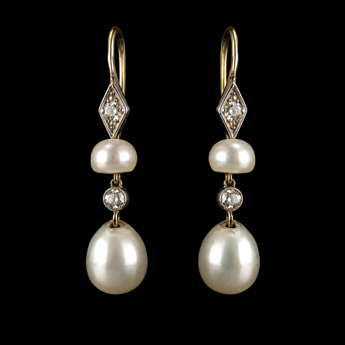 PAIR OF CERTIFICATED NATURAL SALTWATER PEARL AND DIAMOND DROP EARRINGS: PAIR OF CERTIFICATED NATURAL SALTWATER PEARL AND DIAMOND DROP EARRINGS,testing 18 ct. gold.Largest pearl of approx. 8 mm.L. 3.1 cm.