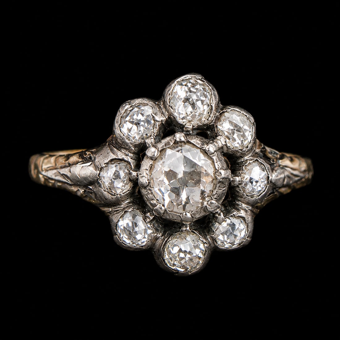 ANTIQUE DIAMOND CLUSTER RING: ANTIQUE DIAMOND CLUSTER RING,testing 18 ct. gold and silver.Diamonds bright and lively.Size L 1/2.