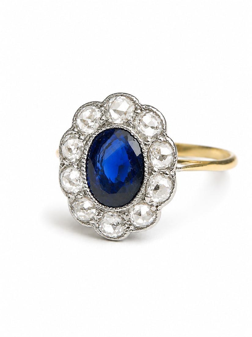 SAPPHIRE AND DIAMOND CLUSTER RING: SAPPHIRE AND DIAMOND CLUSTER RING,testing 18 ct. gold and platinum.Lovely sapphire.Diamonds bright and lively.Size J 1/2.