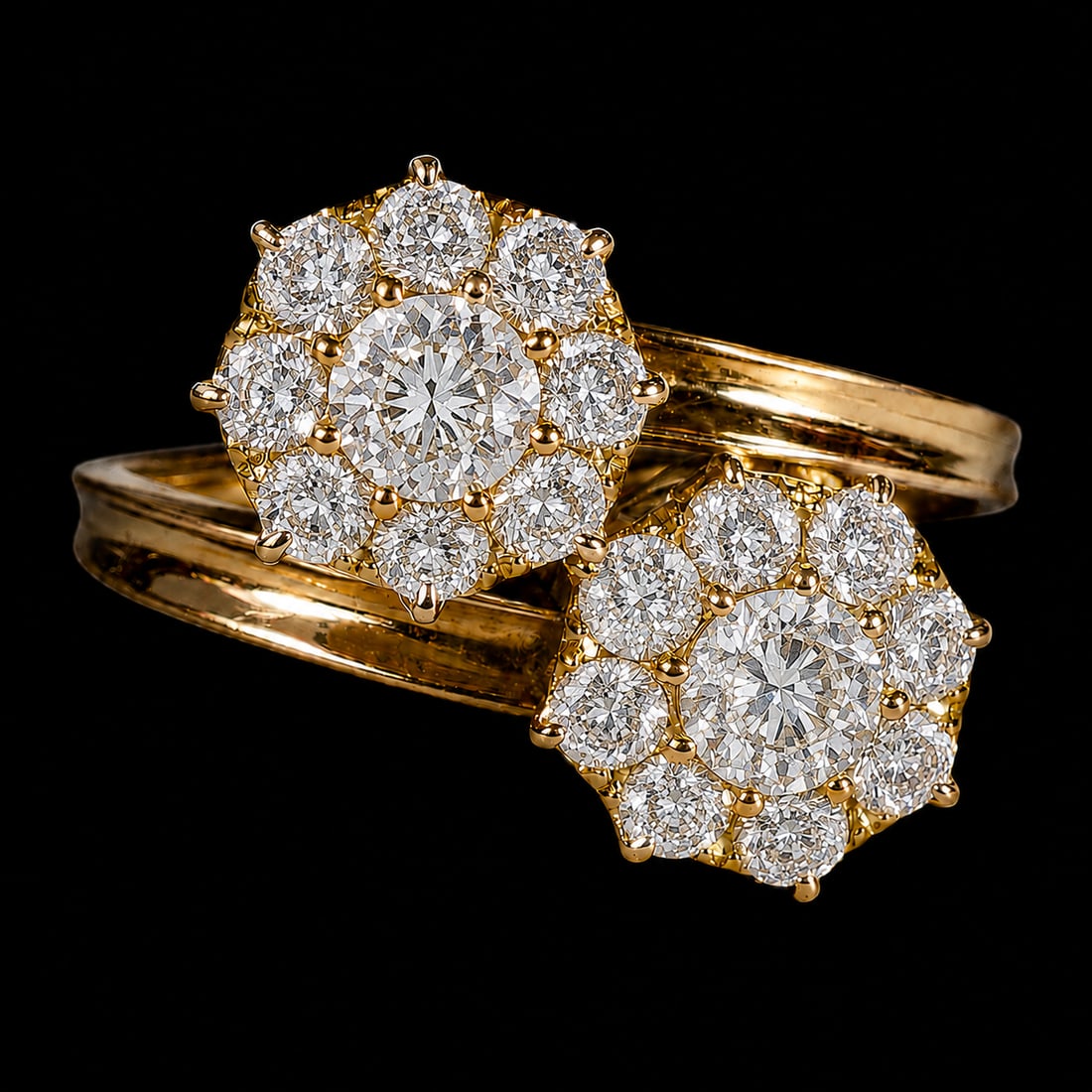 DIAMOND DOUBLE CLUSTER TWIST RING: DIAMOND DOUBLE CLUSTER TWIST RING,testing high carat gold.Bright and lively old cut diamonds, totalling approx. 0.96 ct.Size J.