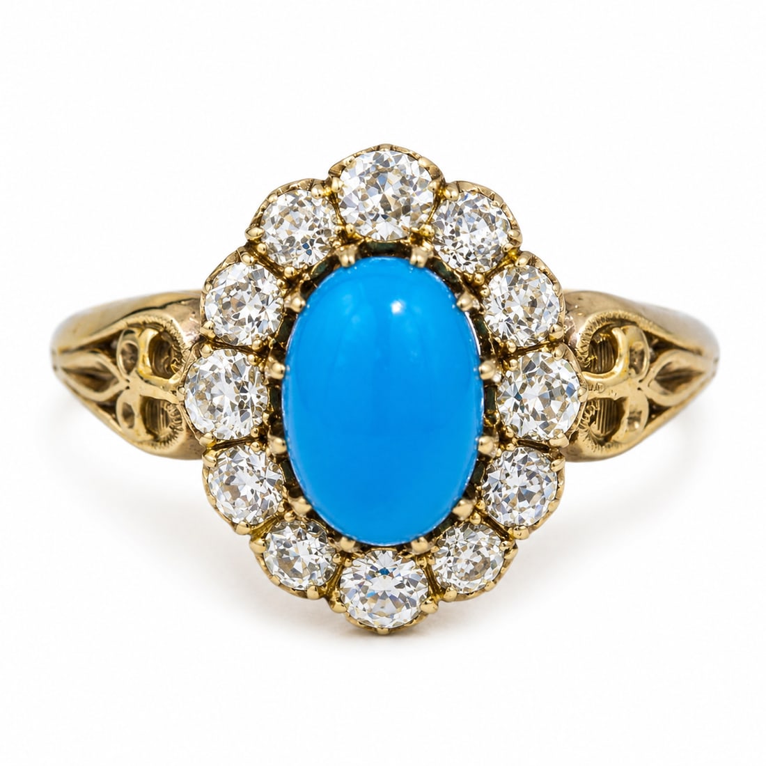 ANTIQUE TURQUOISE AND DIAMOND CLUSTER RING: ANTIQUE TURQUOISE AND DIAMOND CLUSTER RING,4,6 grams, testing 18 ct. gold.Rich and vibrant turquoise.Diamonds bright and lively old cut diamonds.Size Q.