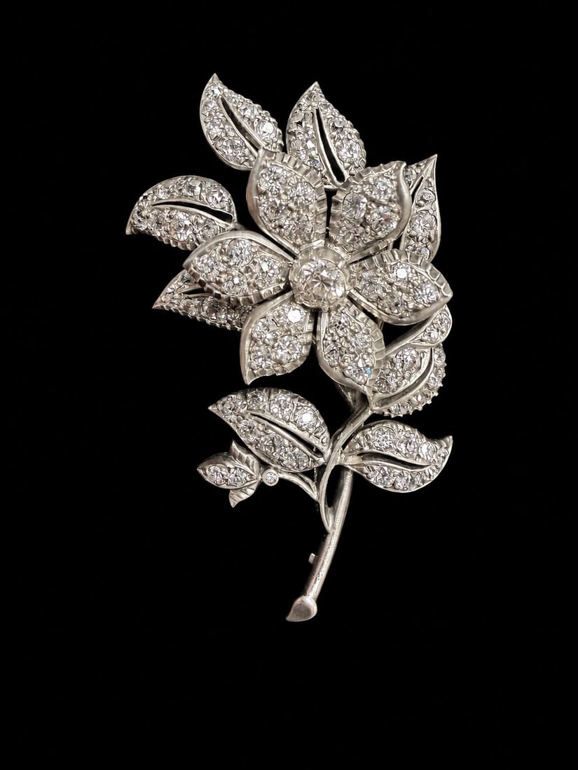 VICTORIAN EN TREMBLANT DIAMOND SPRAY BROOCH: VICTORIAN EN TREMBLANT DIAMOND SPRAY BROOCH,15,5 grams, testing high carat gold and silver.The flowerhead en tremblant.Diamonds bright and lively, totalling approx. 3.50 ct.L. 5.9 cm.