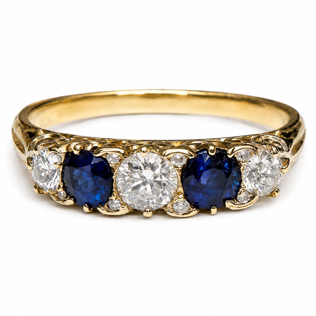 ANTIQUE SAPPHIRE AND DIAMOND 5-STONE RING: ANTIQUE SAPPHIRE AND DIAMOND 5-STONE RING,3,1 grams, testing 18 ct. gold.Rich and vibrant sapphires.Diamonds bright and lively.Size K 1/2.