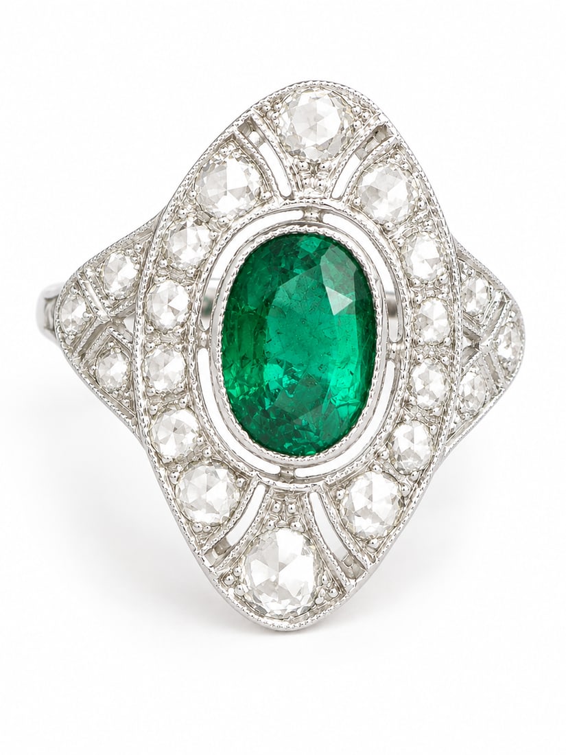 ART-DECO EMERALD AND DIAMOND RING: ART-DECO EMERALD AND DIAMOND RING,5,6 grams, testing platinum.Rich and vibrant emerald of approx. 1.20 ct.Diamonds bright and lively.L. head 2 cm.Size N.