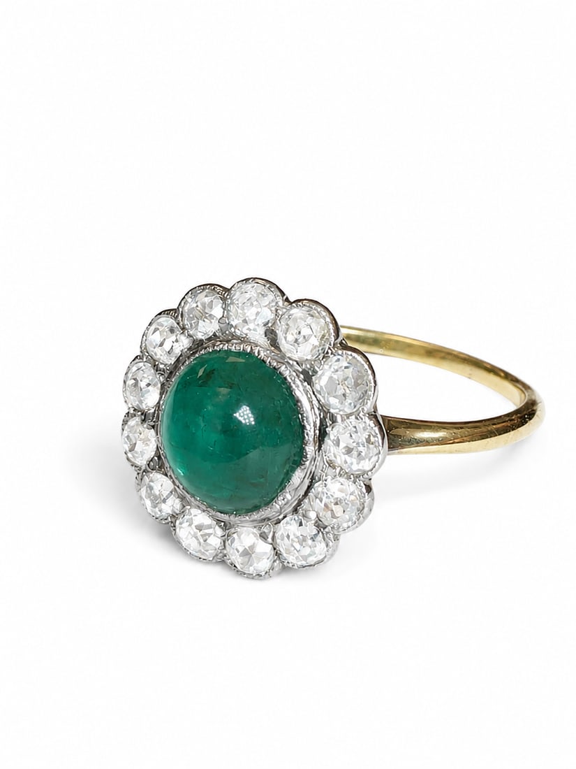 EDWARDIAN EMERALD AND DIAMOND CLUSTER RING: EDWARDIAN EMERALD AND DIAMOND CLUSTER RING,testing 18 ct. gold and platinum.Lovely cabochon cut emerald.Diamonds bright and lively.Size N 1/2.