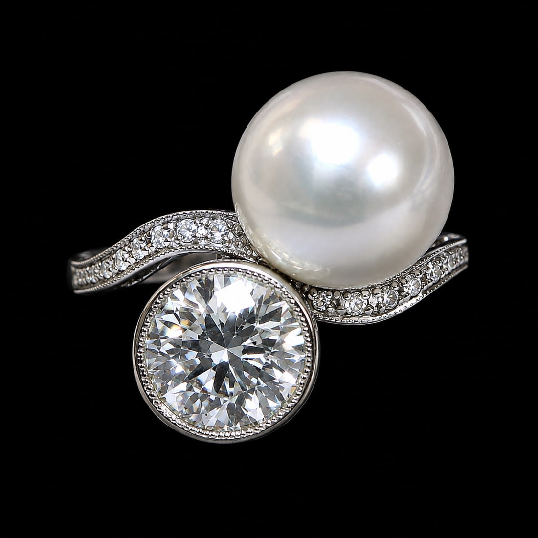 FINE EDWARDIAN CERTIFICATED NATURAL PEARL AND DIAMOND TOI-ET-MOI TWIST RING: FINE EDWARDIAN CERTIFICATED NATURAL PEARL AND DIAMOND TOI-ET-MOI TWIST RING,5,9 grams, testing 18 ct. gold and platinum.Large pearl of approx. 10.47 x 10.46 x 6.31 mm. (Certificated, Natural Salt wate