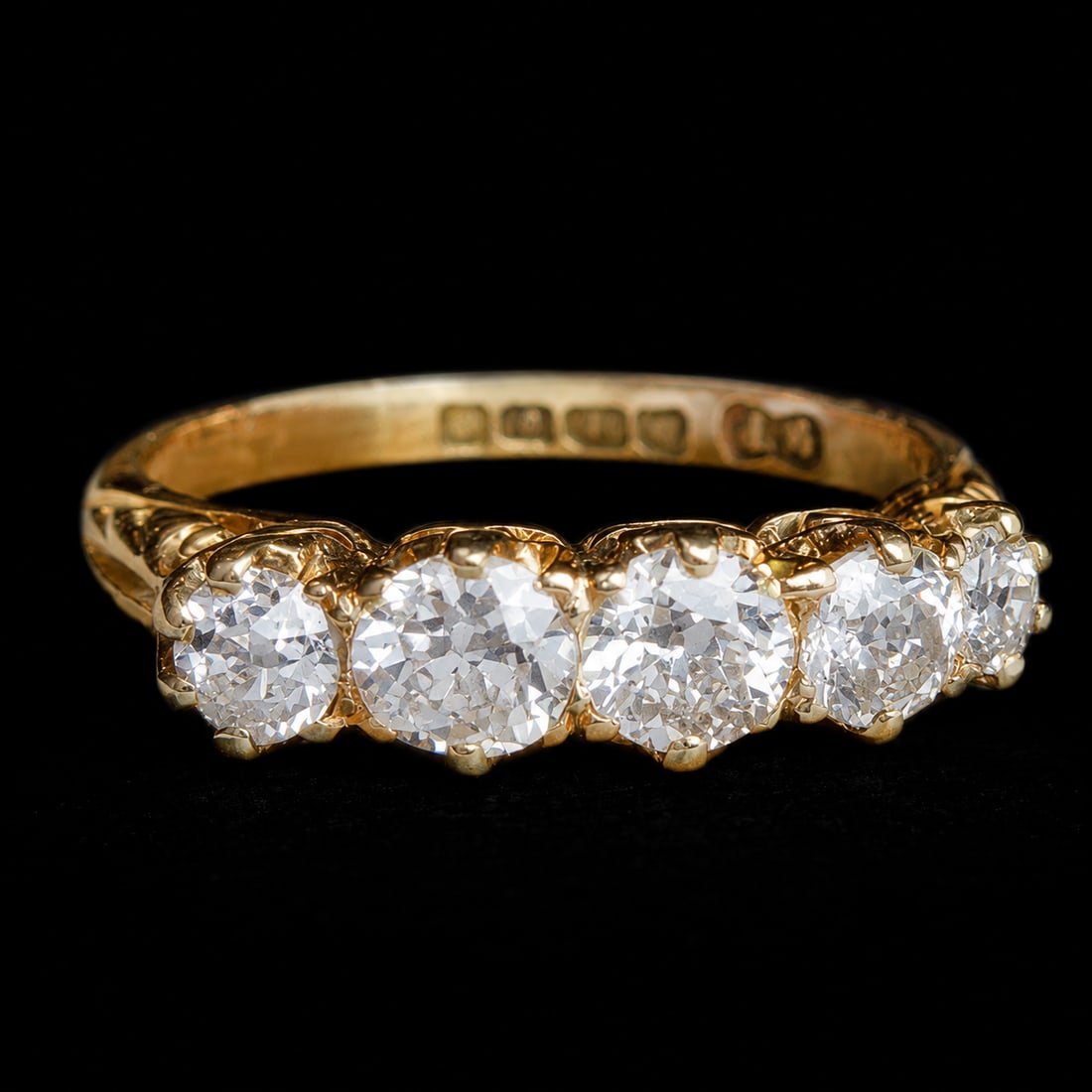 ANTIQUE DIAMOND 5-STONE RING: ANTIQUE DIAMOND 5-STONE RING,3 grams, 18 ct. gold.Bright and lively old cut diamonds, totalling approx. 1.20 ct.Size L 1/2.