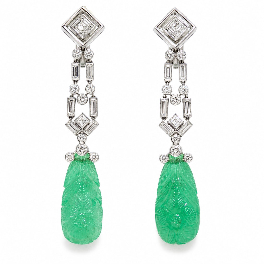 FANTASTIC PAIR OF ART-DECO EMERALD AND DIAMOND DROP EARRINGS: FANTASTIC PAIR OF ART-DECO EMERALD AND DIAMOND DROP EARRINGS,19.8 grams, testing platinum.Each earring suspending a fine mughal carved emerald, totalling approx. 36-40 ct.Suspending from an articulate