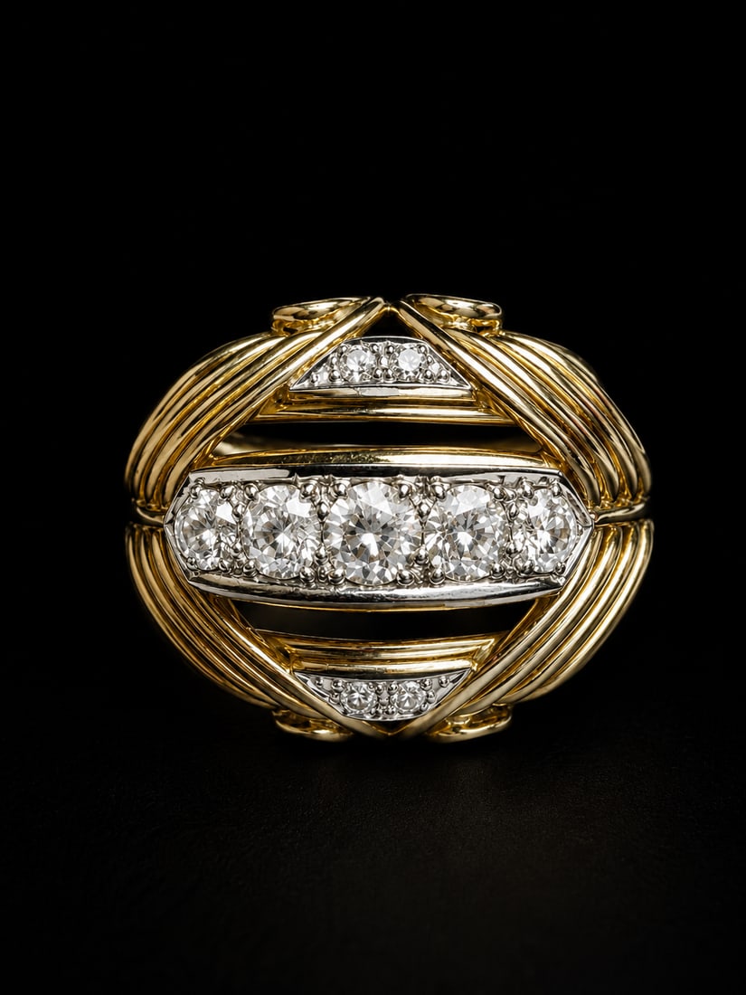 DIAMOND BOMBE RING: DIAMOND BOMBE RING,13.8 grams, 18 ct. gold.Bright and lively diamonds, totalling approx. 1.20 ct.Lovely openwork design.Size K 1/2.