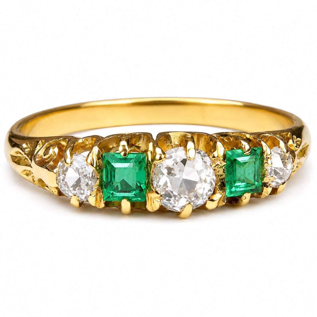EMERALD AND DIAMOND 5-STONE RING: EMERALD AND DIAMOND 5-STONE RING,3,3 grams,18 ct. gold.Rich and vibrant emeralds.Diamonds bright and lively.Size O 1/2.