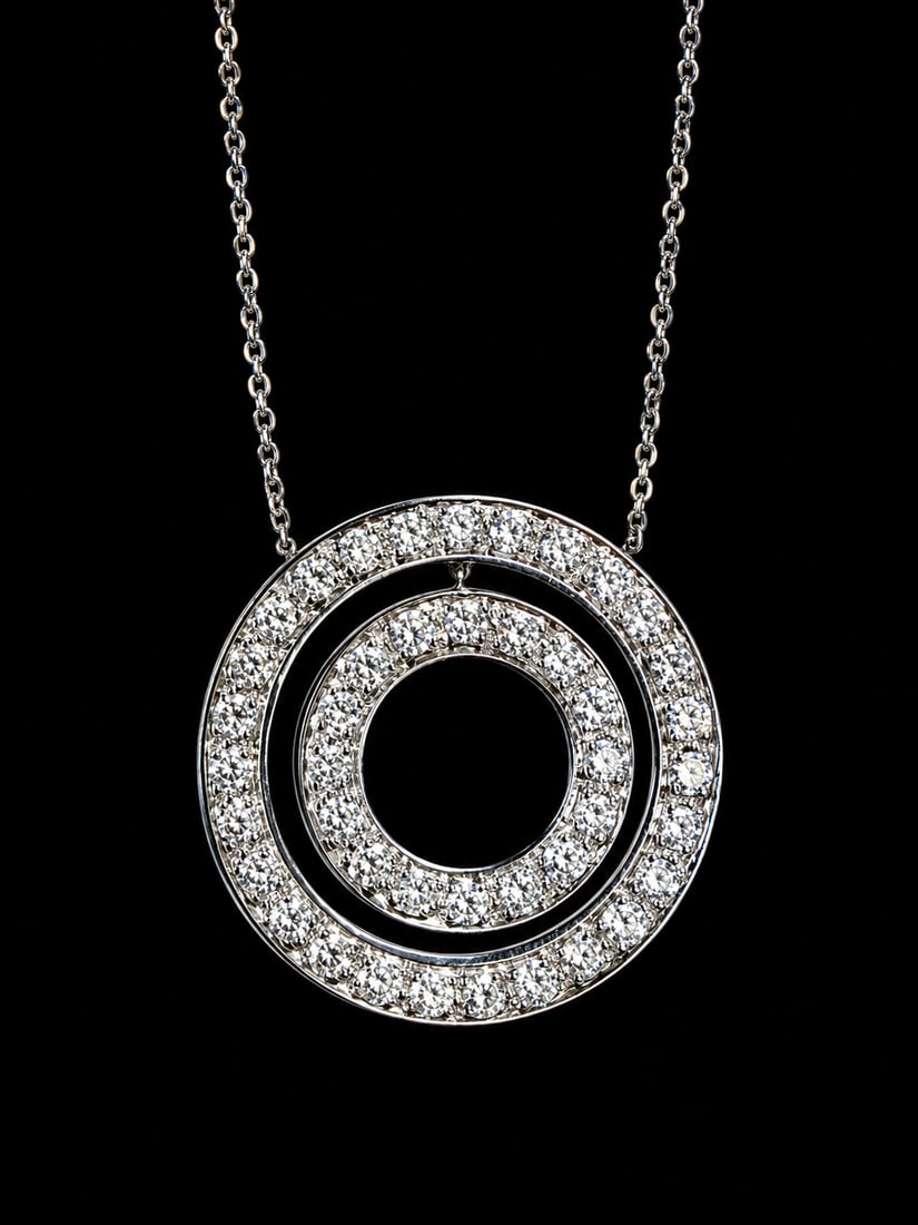 DIAMOND PENDANT NECKLACE: DIAMOND PENDANT NECKLACE,10.1 grams, testing 18 ct. gold.Diamond bright and lively in a double halo.Totalling approx. 3.10 ct.L. pendant 2.9 cm.