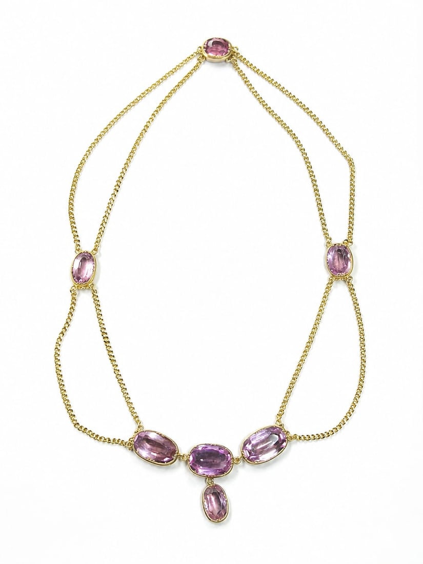 GEORGIAN PINK TOPAZ NECKLACE: GEORGIAN PINK TOPAZ NECKLACE,20.1 grams, testing high carat gold.The topaz foiled back set.Totalling approx. 25 ct. of fine topaz.L. necklace 36.5 cm.