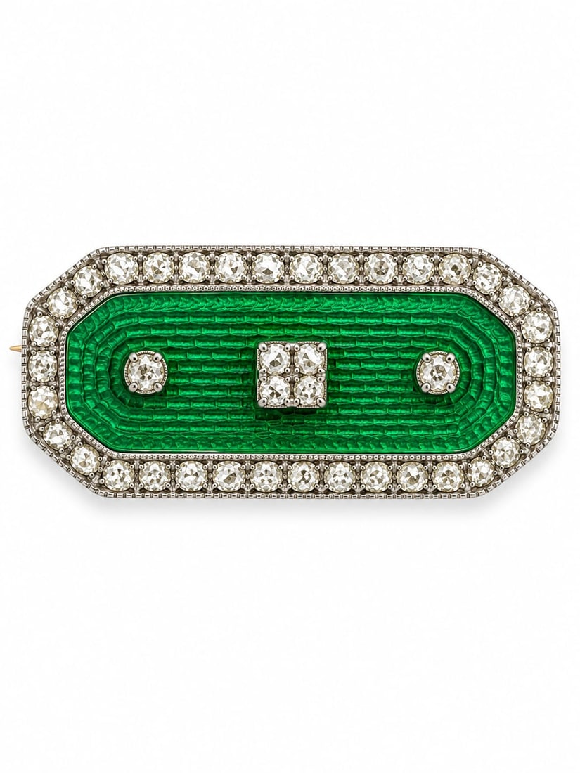 ANTIQUE GREEN ENAMEL AND DIAMOND BROOCH: ANTIQUE GREEN ENAMEL AND DIAMOND BROOCH,6.8 grams.Lovely vibrant green enamel.Diamonds bright and lively.W. 2.9 cm.
