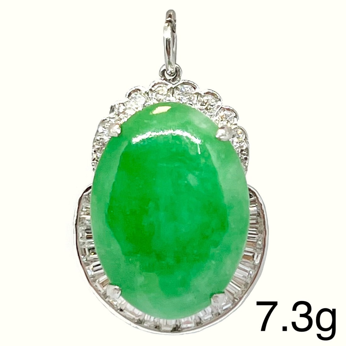 JADE AND DIAMOND PENDANT: JADE AND DIAMOND PENDANT 7.3 grams high carat gold vibrant jade with no abrasions bright lively diamonds L 3 cm
