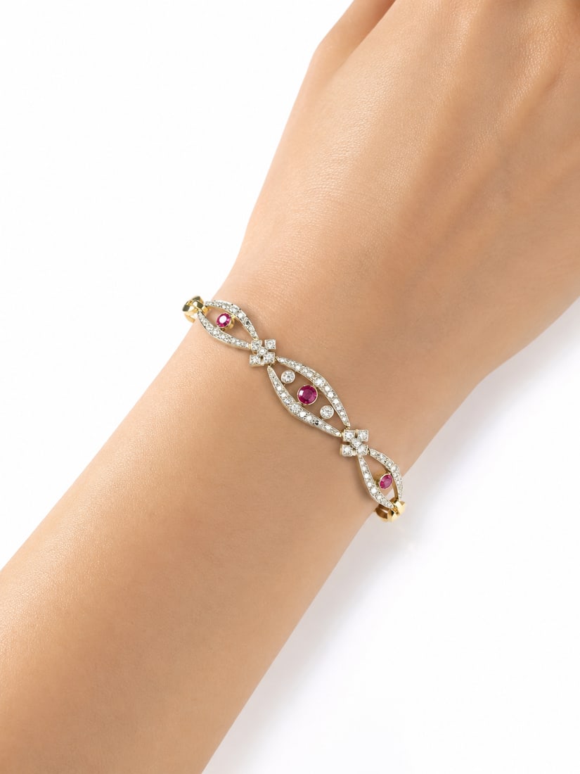 LOVELY EDWARDIAN RUBY AND DIAMOND BRACELET: LOVELY EDWARDIAN RUBY AND DIAMOND BRACELET,13.3 grams, testing high carat gold and platinum.Rich and vibrant rubies.Diamonds bright and lively.L. 17 cm.