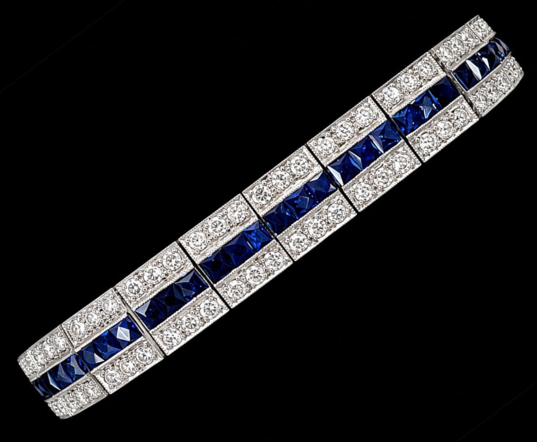 ART DECO SAPPHIRE AND DIAMOND BRACELET: ART DECO SAPPHIRE AND DIAMOND BRACELET 20.1 grams, testing high carat gold and platinum rich vibrant matching sapphires totalling approx. 4 ct. bright old cut diamonds totalling approx. 4 ct. L. 17 cm