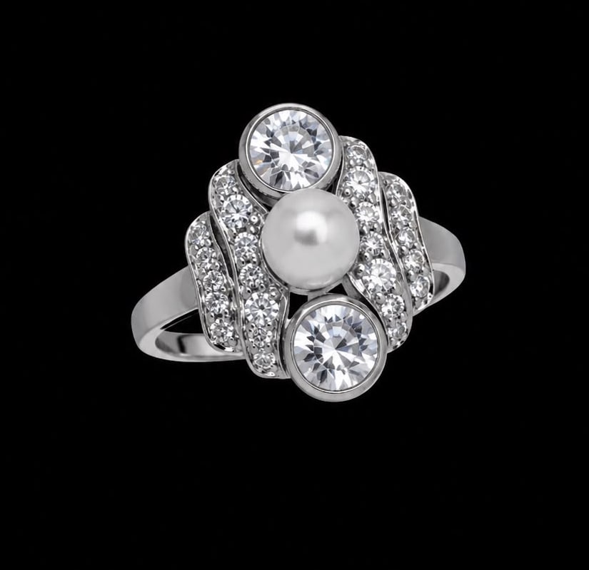 EDWARDIAN PEARL AND DIAMOND RING: EDWARDIAN PEARL AND DIAMOND RING,4 grams, testing platinum.Bright and lively diamonds, totalling approx. 1.20 ct.Lovely pearl (untested, believed to be natural).Size L 1/2.