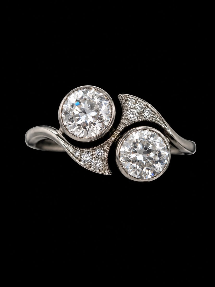 DIAMOND TOI-ET-MOI TWIST RING: DIAMOND TOI-ET-MOI TWIST RING,testing platinum.Bright and lively diamonds.Size M 1/2.