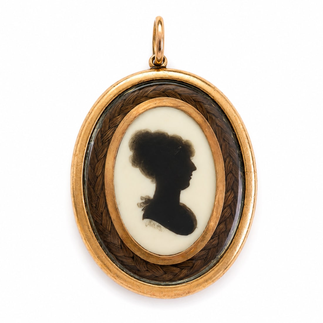 RARE AND UNUSUAL GEORGIAN DOUBLE SIDED SILHOUETTE GOLD PENDANT: RARE AND UNUSUAL GEORGIAN DOUBLE SIDED SILHOUETTE GOLD PENDANT,7.6 grams.The front depicting the bust of a woman.The back depicting the bust of a man.L. 3.8 cm.