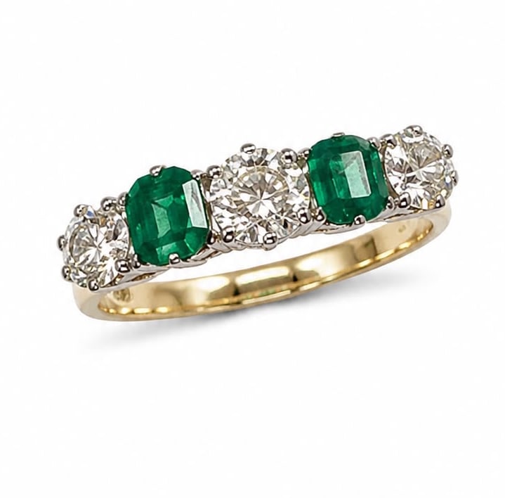 EMERALD AND DIAMOND FIVE STONE RING: EMERALD AND DIAMOND FIVE STONE RING 3 grams high carat gold rich vibrant matching emeralds bright lively diamonds size O