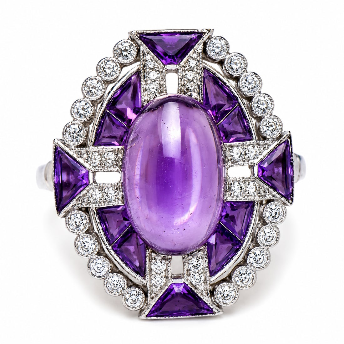 FINE EDWARDIAN AMETHYST AND DIAMOND RING: FINE EDWARDIAN AMETHYST AND DIAMOND RING,9.3 grams, testing high carat gold.Rich and vibrant amethyst, with a larger cabochon cut amethyst to the centre.Diamonds bright and lively.L. head 2.5 cm.Size 