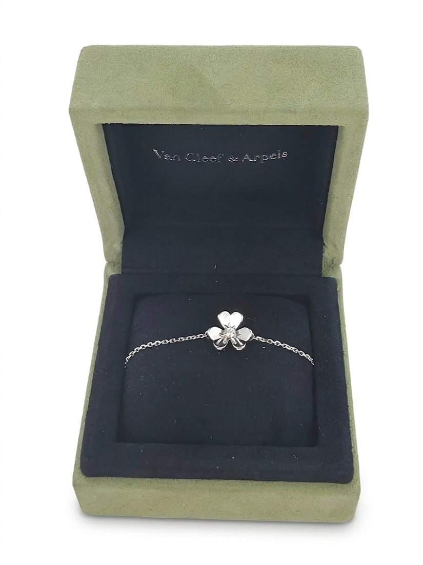 VAN CLEEF & ARPELS, DIAMOND 'FRIVOLE' BRACELET: VAN CLEEF & ARPELS, DIAMOND 'FRIVOLE' BRACELET,18 ct. gold.Bright and lively diamond.Signed VCA, Numbered.L. 19 cm.