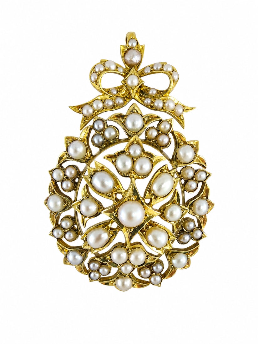 ELEGANT GOLD VCTORIAN OVAL PEARL PENDANT: ELEGANT GOLD VCTORIAN OVAL PEARL PENDANT 11.7 grams Pearls generally well matched, untestedin great condition L 5 cm