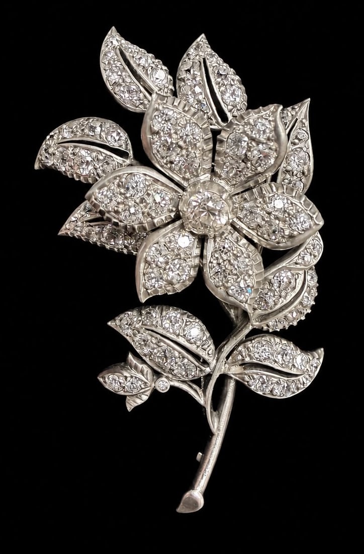 VICTORIAN EN TREMBLANT DIAMOND SPRAY BROOCH: VICTORIAN EN TREMBLANT DIAMOND SPRAY BROOCH,15,5 grams, testing high carat gold and silver.The flowerhead en tremblant.Diamonds bright and lively, totalling approx. 3.50 ct.L. 5.9 cm.