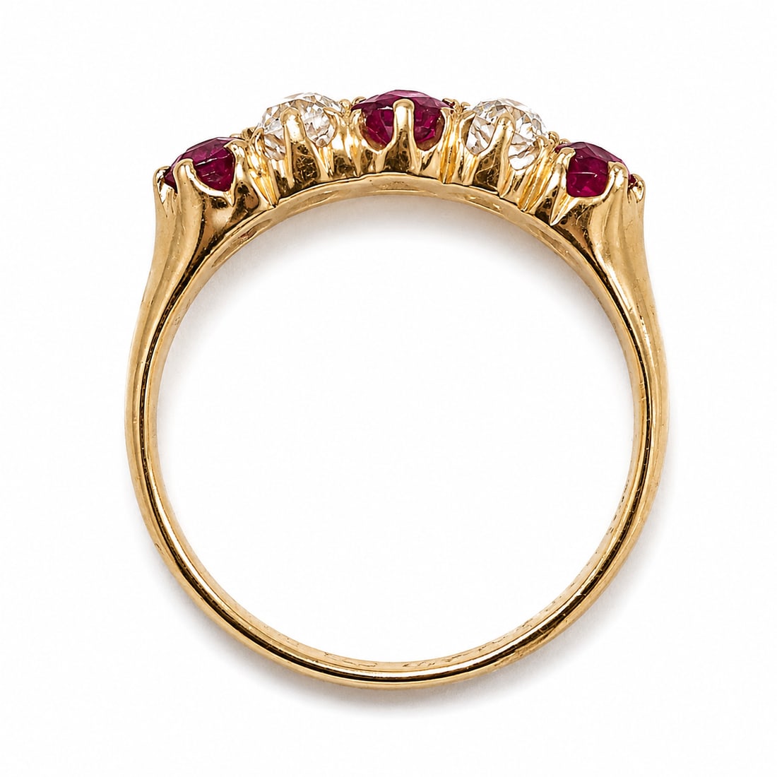 RUBY AND DIAMOND 7-STONE RING: RUBY AND DIAMOND 7-STONE RING 3.2 grams high carat gold rich vibrant rubies with no abrasions bright lively old cut diamonds size O
