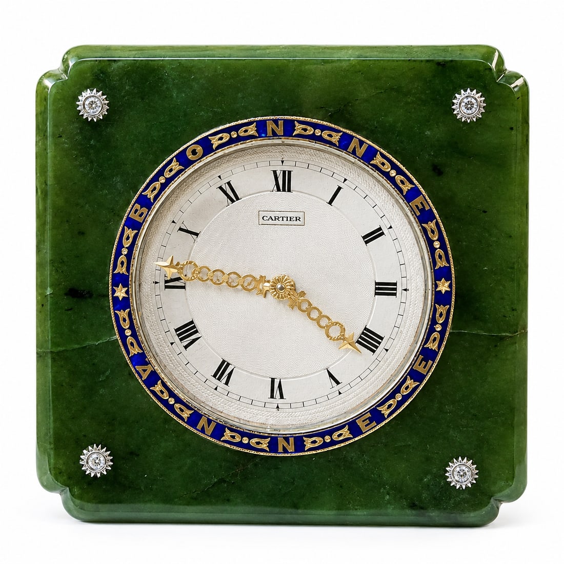 CARTIER An Art Deco nephrite, enamel and diamond desk timepiece, circa 1920,: CARTIER An Art Deco nephrite, enamel and diamond desk timepiece, circa 1920, The silvered dial with engine turned decoration, with black Roman numeral indicators and gold openwork hands of laurel wrea