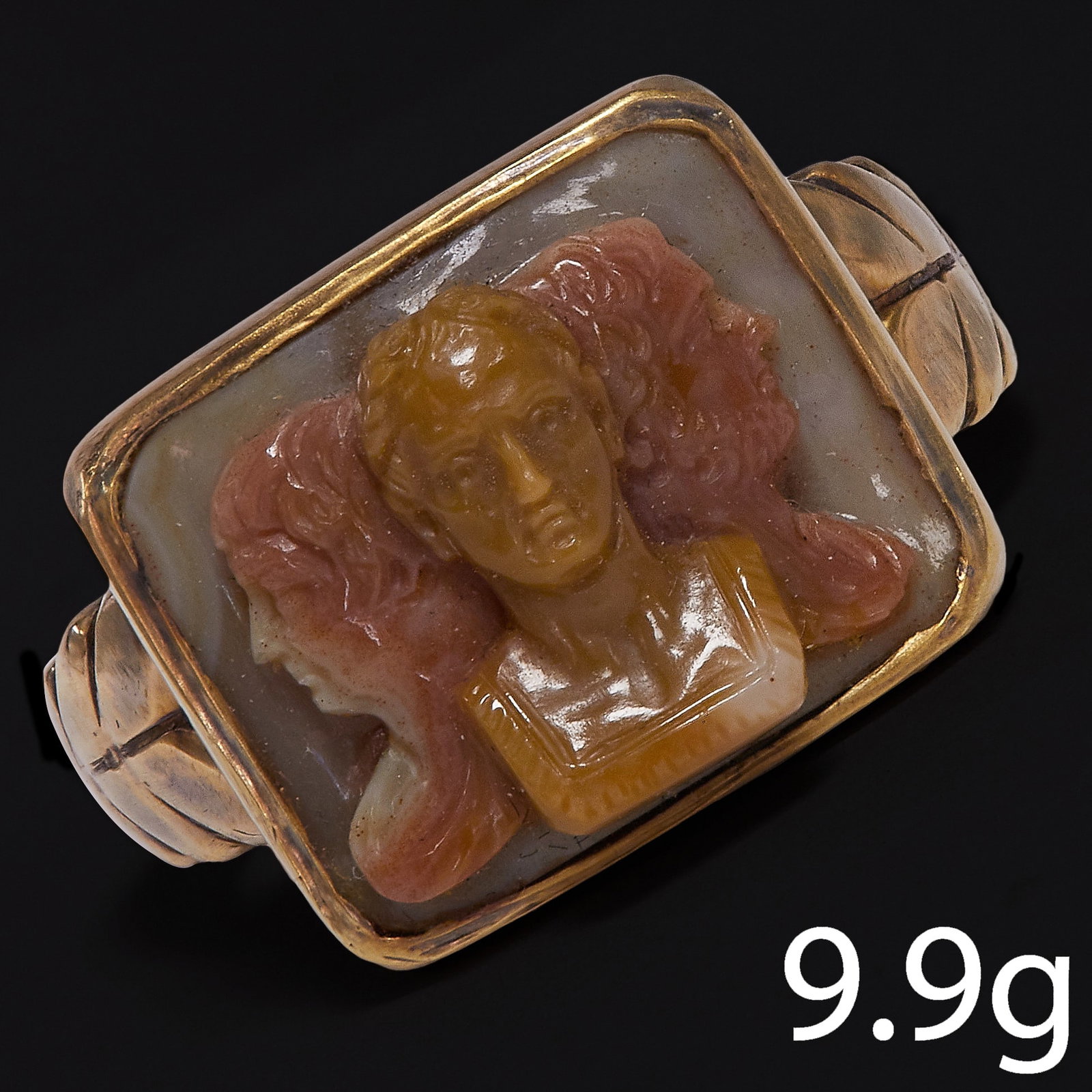 PRESUMABLY ROMAN, HIGHLY UNUSUAL AND EXCEPTIONAL CAMEO TRIPLE PORTRAIT RING, LIKELY DEPICTING FIRST: PRESUMABLY ROMAN, HIGHLY UNUSUAL AND EXCEPTIONAL CAMEO TRIPLE PORTRAIT RING, LIKELY DEPICTING FIRST TRIUMVIRATE,9.9 grams, testing 18 ct. gold.The fine carved cameo likely depicting Julies Caesar, Pom