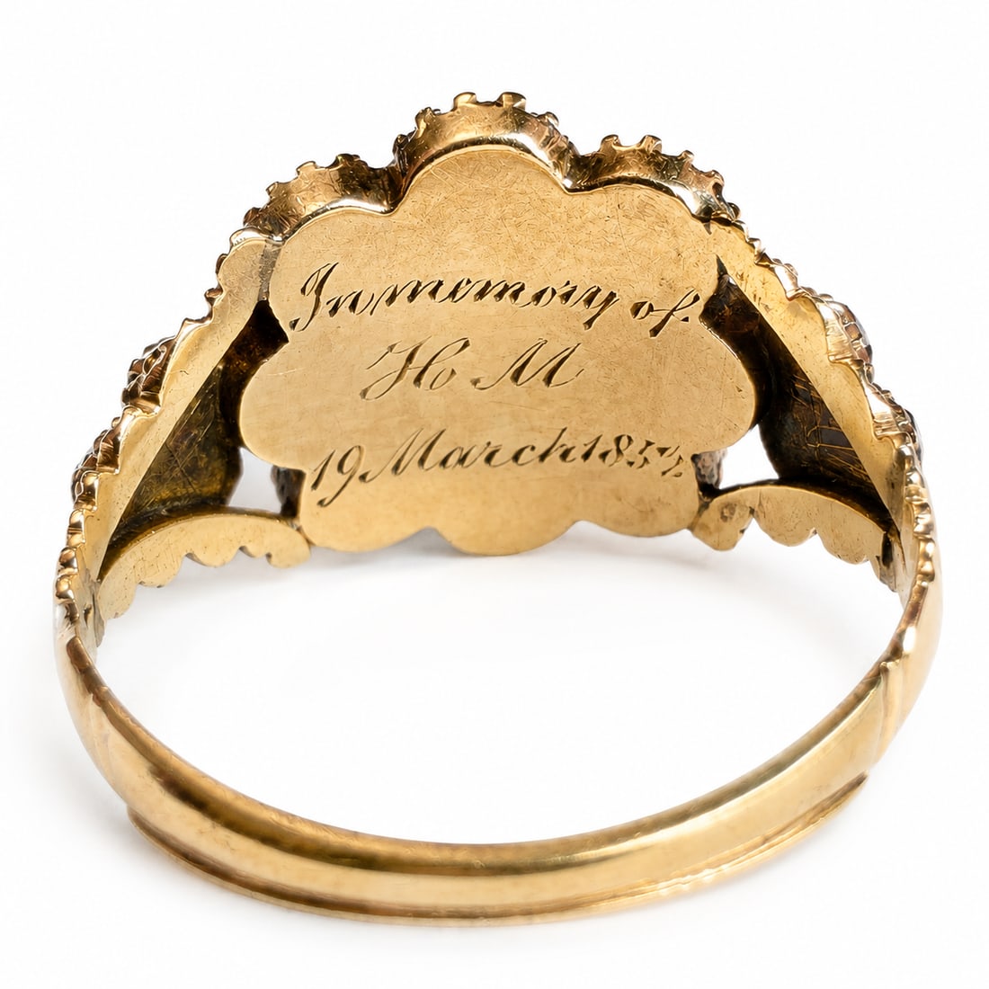 VICTORIAN ONYX MEMORIAL RING: VICTORIAN ONYX MEMORIAL RINGTesting high carat gold. Inscribed to verso, 'In Memory of H.M. 19 March 1852.'Size M.