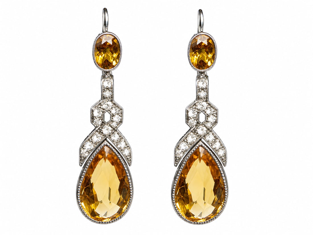 ELEGANT PAIR OF CITRINE AND DIAMOND EARRINGS: ELEGANT PAIR OF CITRINE AND DIAMOND EARRINGS 7.9 grams platinum vibrant citrines with no abrasions bright lively diamonds in excellent condition L 4.8 cm