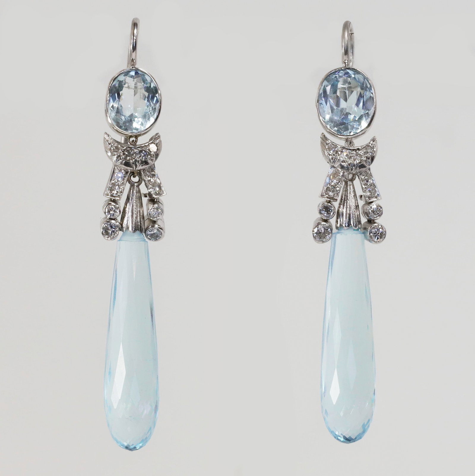 ELEGANT PAIR OF BRIOLETTE AQUAMARINE AND DIAMOND EARRINGS: ELEGANT PAIR OF BRIOLETTE AQUAMARINE AND DIAMOND EARRINGS 8.6 grams high carat gold fine vibrant aquamarines with no abrasions bright lively diamonds L 5.4 cm