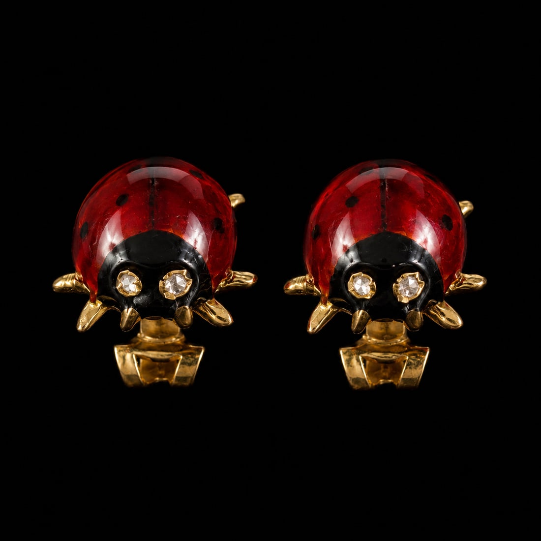 PAIR OF ENAMEL AND DIAMOND STUD EARRINGS: PAIR OF ENAMEL AND DIAMOND STUD EARRINGS 4.2 grams high carat gold enamel in great condition diamond eyes L 1 cm