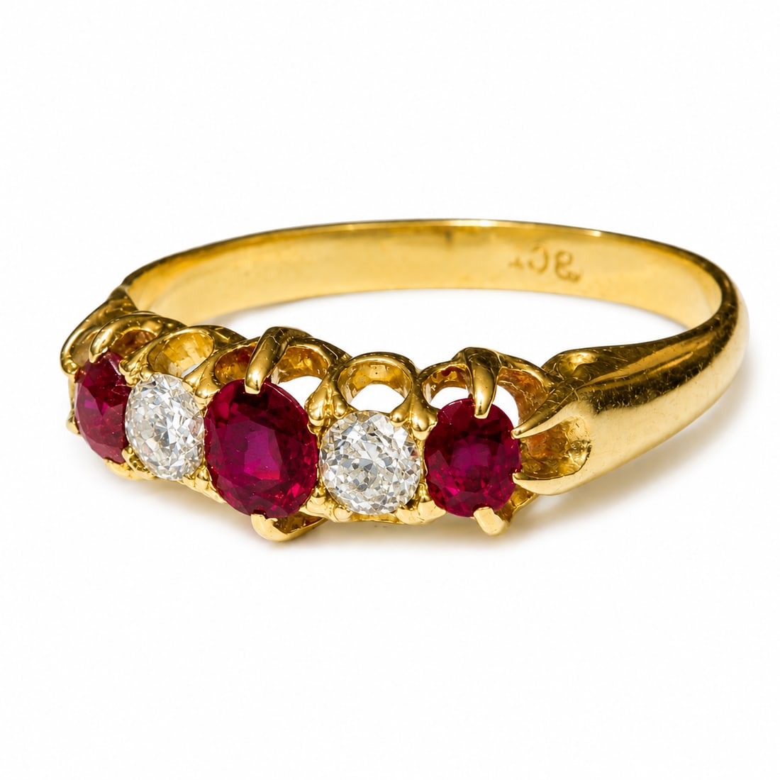RUBY AND DIAMOND 5-STONE RING,: RUBY AND DIAMOND 5-STONE RING,testing 18 ct. gold.Rich and vibrant rubies.Diamonds bright and lively.Size N 1/2.