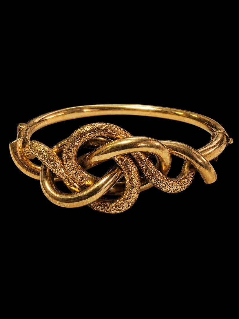 ANTIQUE GOLD KNOT BANGLE: ANTIQUE GOLD KNOT BANGLE 13.6 grams 18 ct in great condition 6 cm inner diameter