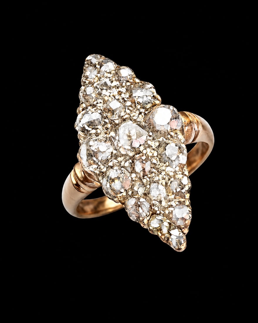 ANTIQUE MARQUISE SHAPED DIAMOND RING,: ANTIQUE MARQUISE SHAPED DIAMOND RING,3,3 grams, testing 18 ct. gold.Bright and lively diamonds, totalling approx. 1.40 ct.L. head 2.2 cm.Size L.