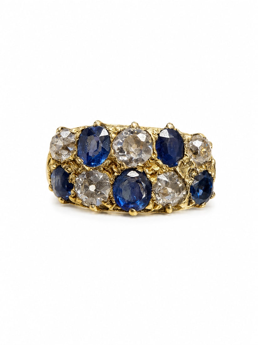 SAPPHIRE AND DIAMOND DOUBLE ROW RING,: SAPPHIRE AND DIAMOND DOUBLE ROW RING,3,7 grams, testing 18 ct. gold.Alternately set with a sapphire and diamond.Rich and vibrant sapphires, totalling approx. 1.70 ct.Diamonds bright and lively, totall