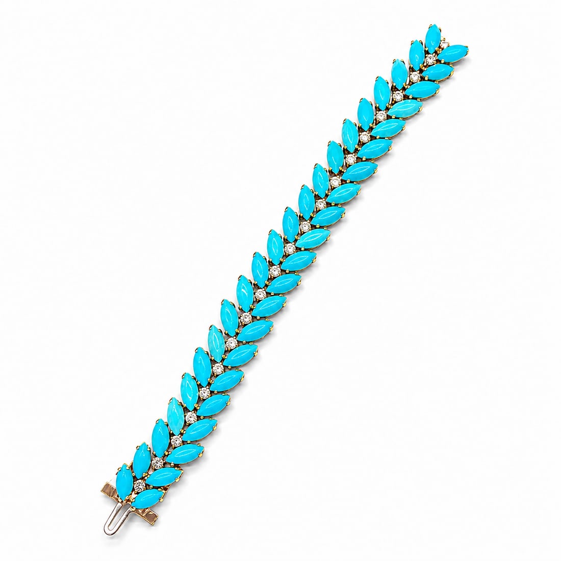 FINE TURQUOISE AND DIAMOND BRACELET,: FINE TURQUOISE AND DIAMOND BRACELET,24,9 grams, testing 18 ct. gold.The bracelet of fine articulated design.Lovely marquise shaped turquoise.Diamonds bright and lively.L. 17.5 cm.