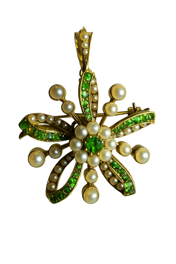 VICTORIAN DEMANTOID GARNET AND PEARL BROOCH/PENDANT,: VICTORIAN DEMANTOID GARNET AND PEARL BROOCH/PENDANT,9.1 grams, 15 ct. gold.Vibrant demantoid garnets.Lovely pearls, well matched (untested, believed to be natural).L. 4 cm.Removable brooch fitting.