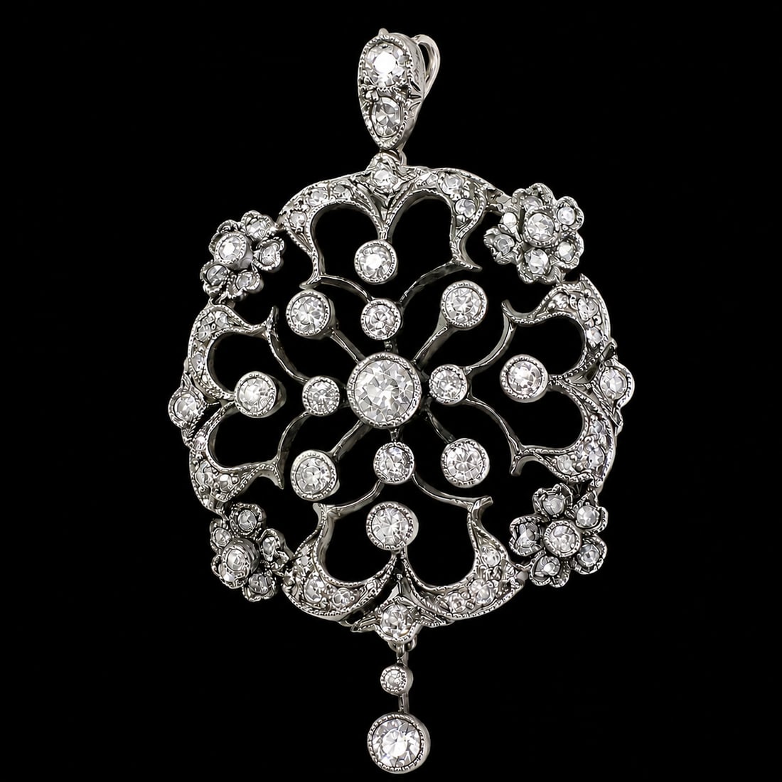 EDWARDIAN DIAMOND PENDANT: EDWARDIAN DIAMOND PENDANT 5.8 grams set with lively old cut diamonds in great condition L 4.5 cm W 2.7 cm