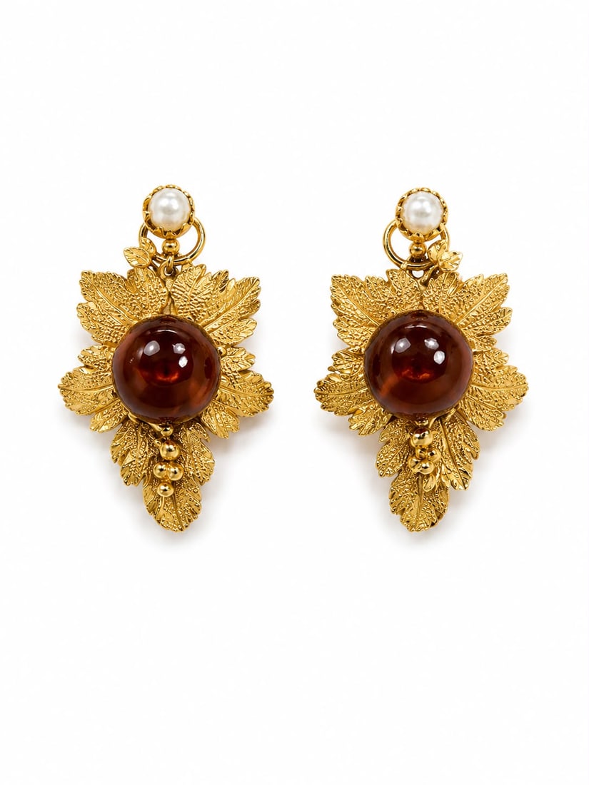 PAIR OF VICTORIAN GARNET AND PEARL FLORAL EARRINGS: PAIR OF VICTORIAN GARNET AND PEARL FLORAL EARRINGS,4,1 grams, testing high carat gold.Rich and vibrant garnets.Pearls untested.L. 1 cm.