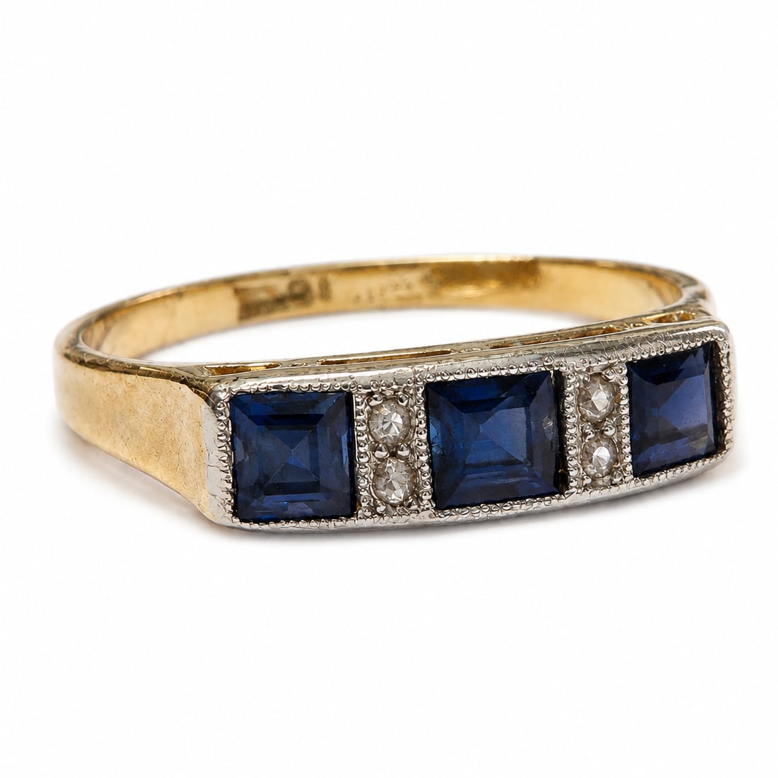 SAPPHIRE AND DIAMOND RING,: SAPPHIRE AND DIAMOND RING,18 ct. gold.Rich and vibrant sapphires.Diamonds bright and lively.Size M 1/2.