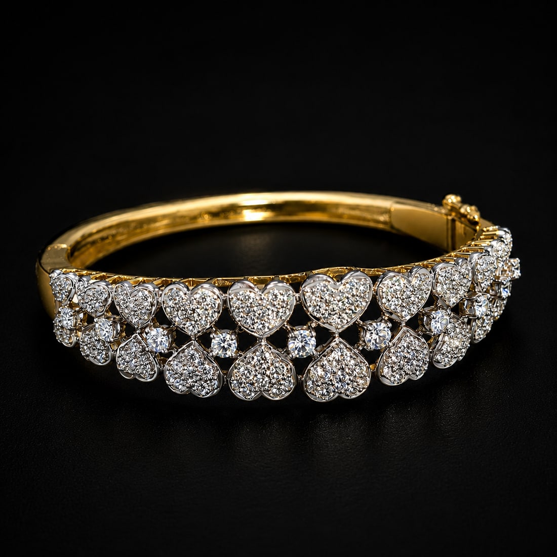ELEGANT DIAMOND HEART BANGLE: ELEGANT DIAMOND HEART BANGLE 25.3 grams 18 ct bright lively diamonds in excellent condition 5.7 cm inner diameter