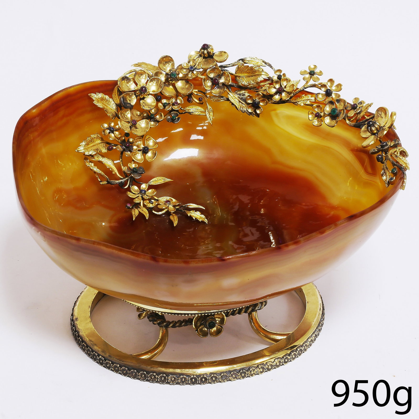 ALEXANDRE REZA, CARNELIAN GEM SET BOWL,: ALEXANDRE REZA, CARNELIAN GEM SET BOWL,950 grams.The bowl of a fine carved carnelian.Set with flowers set with rubies, emeralds and sapphires.Makers mark A. Reza.W. 21 cm.H. 12 cm.Alexandre Reza